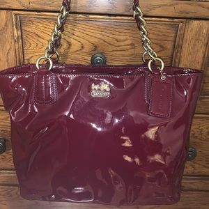 Red patent leather coach handbag